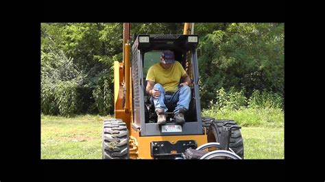 Skid Loader Transfer for persons in wheelchairs 